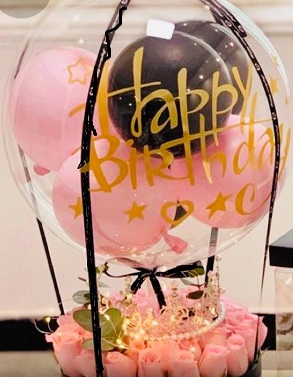 Pink black Balloon inside clear bubble balloon with 20 pink roses and fairy lights