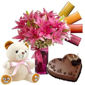 6 lilies vase+4 temptation chocolates+1/2 kg Cake+ 6 inch teddy