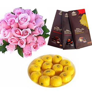 1/2 kg kesar peda with 12 pink roses and 3 Bourneville